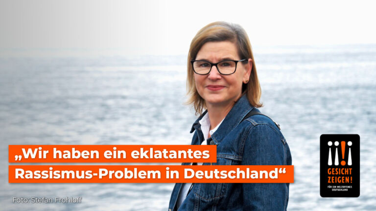 Eine Frau lächelt in die Kamera. Auf dem Foto steht: "WIr haben ein eklatantes Rassismus-Problem in Deutschland"